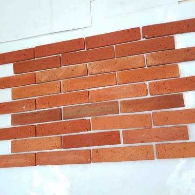 Red reclaimed old used brick with rustic surface for wall